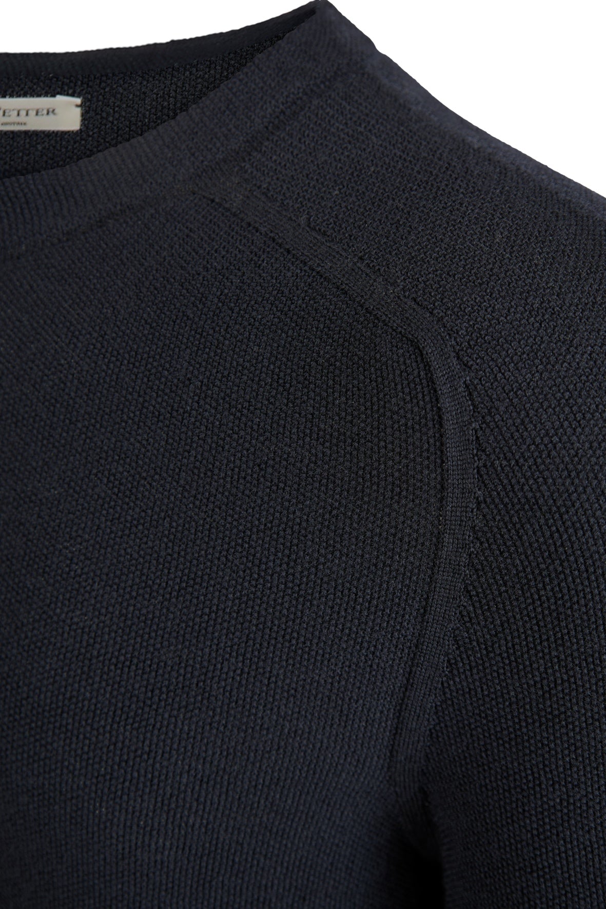 Seamlessly knitted sweater with rice grain structure made of 100% merino wool, regular fit
