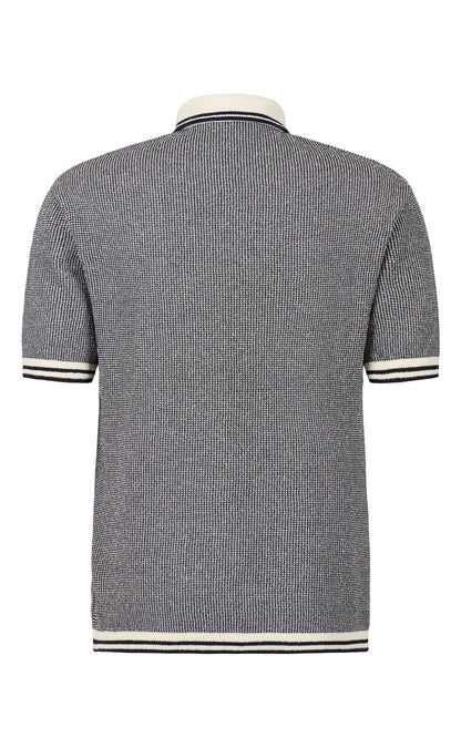 Polo shirt in piqué knit made of cotton bouclé, short sleeve, regular fit